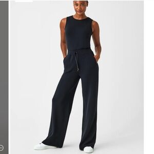 Spanx air essentials jumpsuit. NAVY medium.